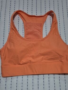 Fabletics Racerback Sports Bra in Orange